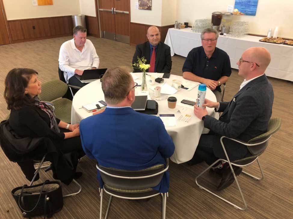 Jon Hart of Praxis Labs, Biola University faculty and SoCal executives at a discussion table