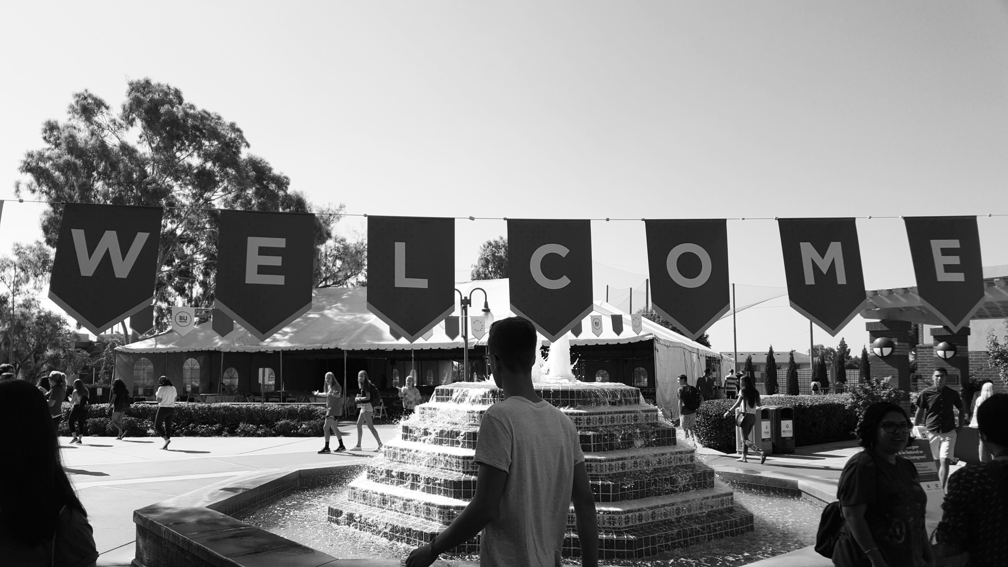 Welcome sign over Fluor Fountain