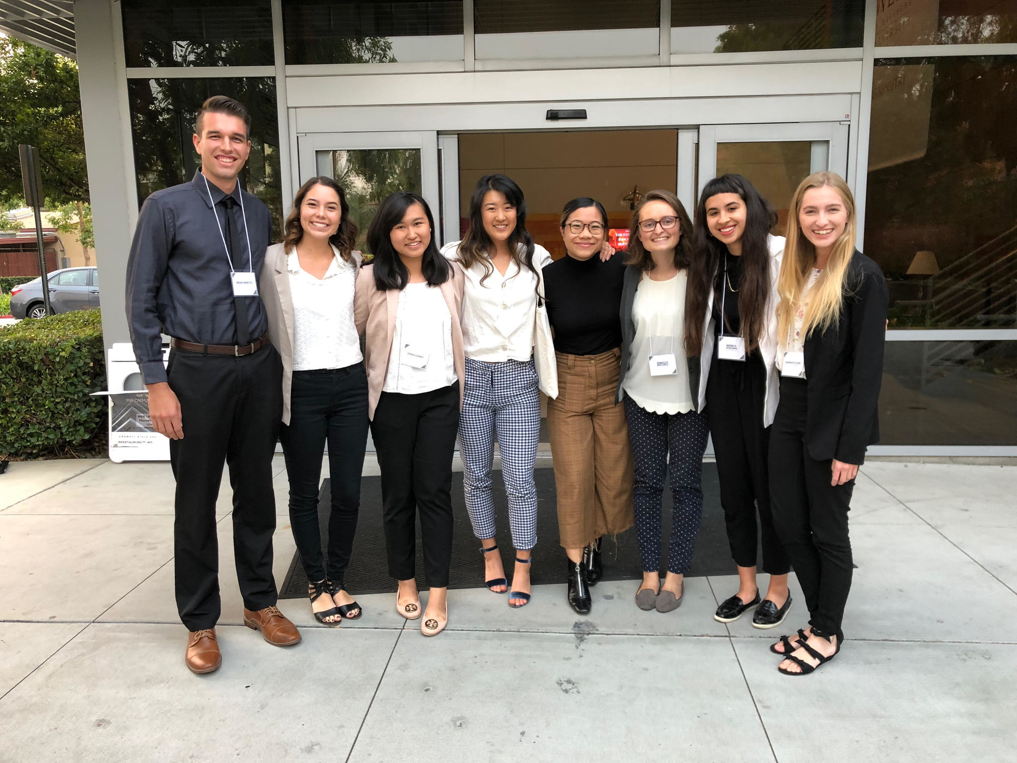 Fiona with journalism team in fancy clothing