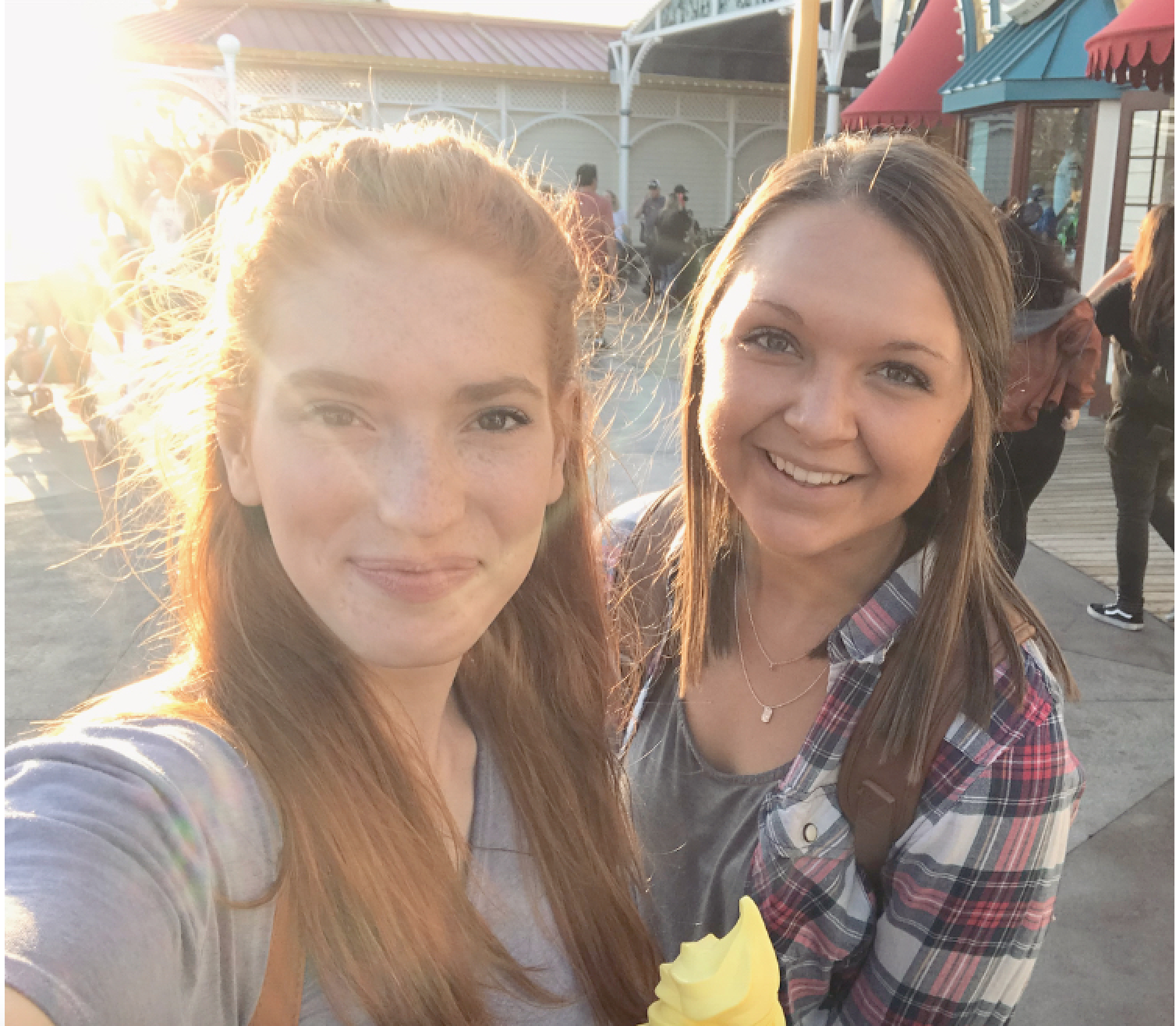 2 girls smiling in the sunshine