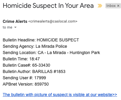 A phishing email message with the subject, Homicide Suspect In Your Area.