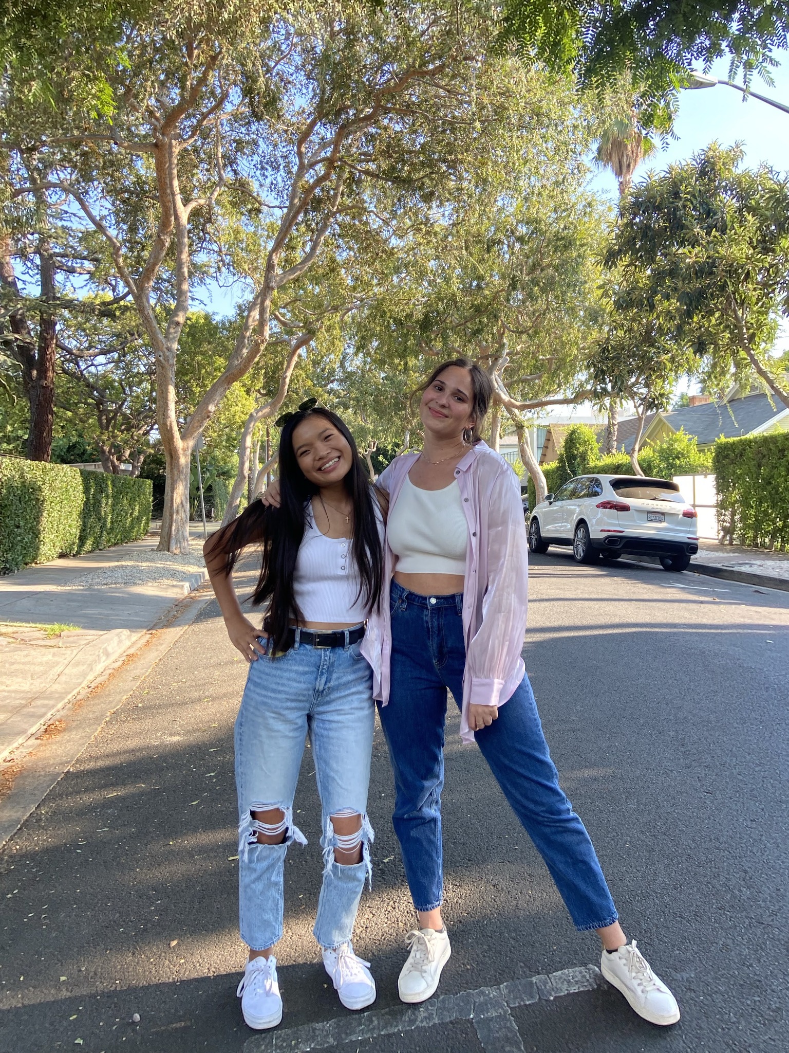 Maggie and her roommate standing in the street at La Mirada.