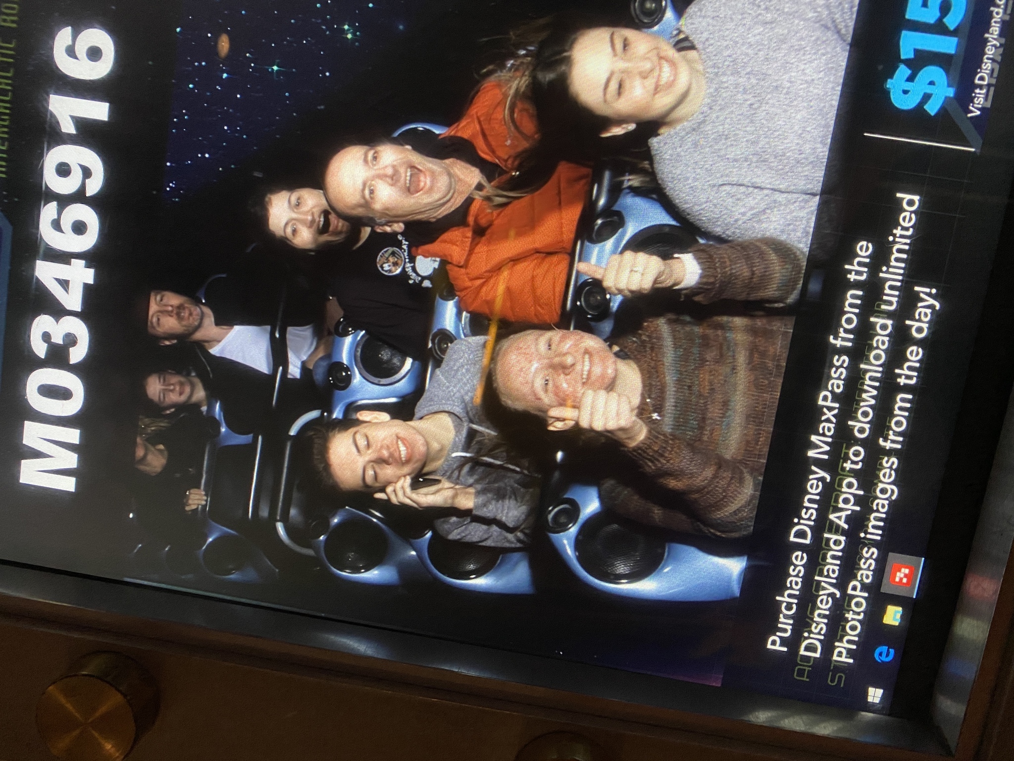 Ethan and some friends on Space Mountain at Disneyland. Caption: Me and friends at Disneyland, taking some fun photos!