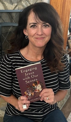image shows Jeannine Hanger with her book