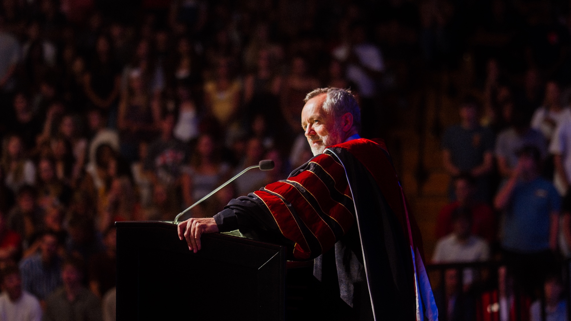 President Corey, entering his 20th year of his tenure at Biola, stands before the community