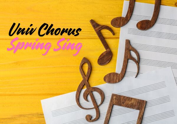 Brown wooden music notes on staff paper and a yellow plank background