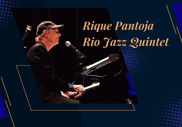 Photo of Rique Pantoja at a keyboard and microphone