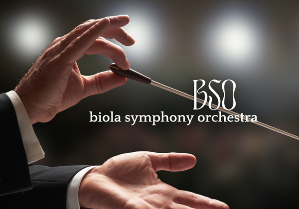 Hands holding a conducting baton