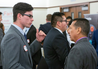 Men talking at networking event