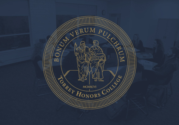 Torrey Honors College logo on dark blue background