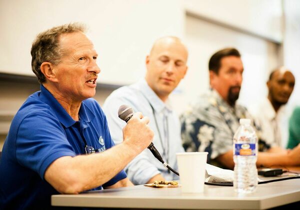 Professor speaking on a panel