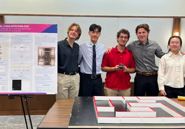 Student presenting poster