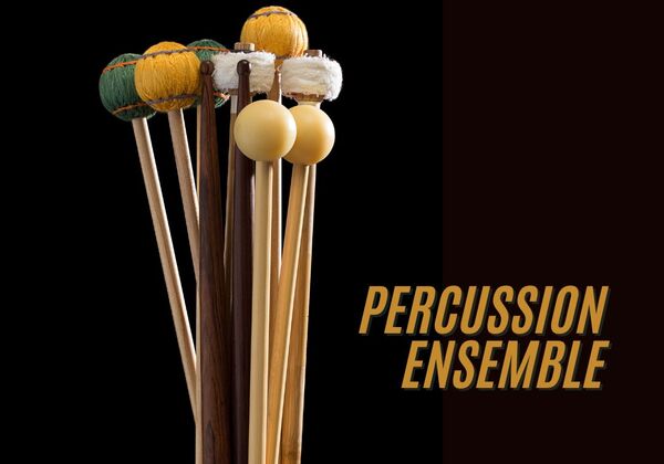 Group of percussion mallets on a black background