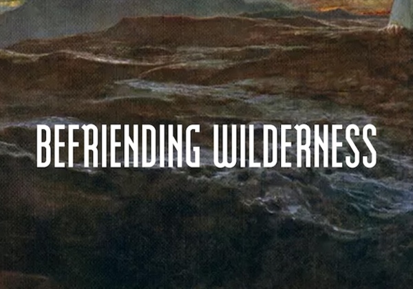 Befriending Wilderness text over rock painting