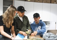 Students doing research in a lab.