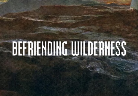 Befriending Wilderness text over rock painting