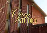 Crowell Hall behind "open studio"