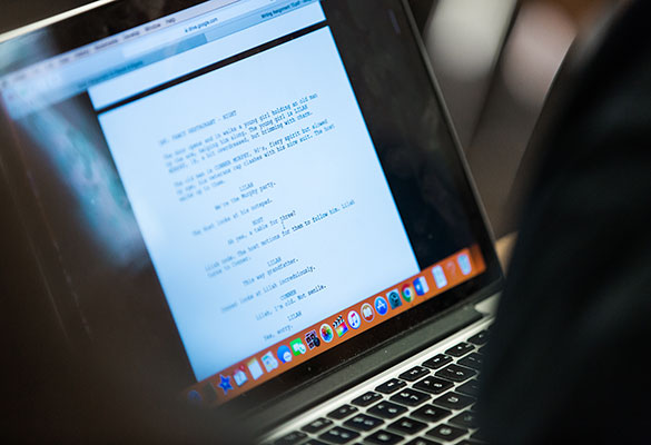 A screenplay on a laptop screen