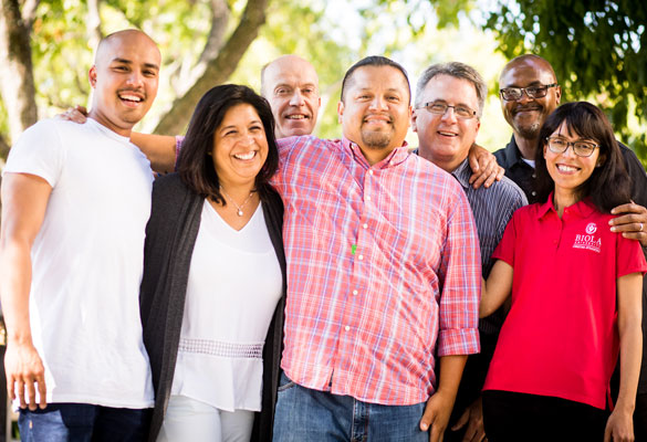 Christian Apologetic students standing together smiling