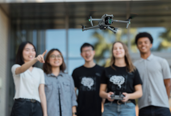 Biola.io students flying a drone