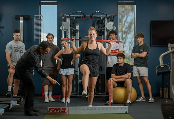 Kinesiology students observing an exercise