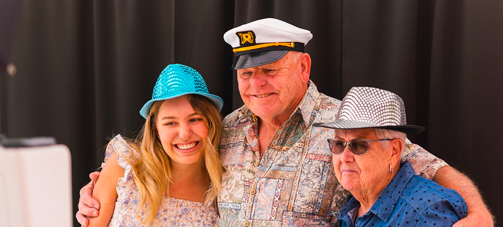 female student with grandparents