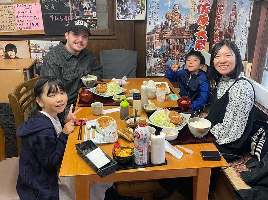 Biola student with local family