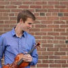 young man holding a violin