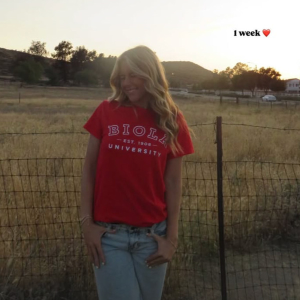 young woman wearing a Biola t-shirt