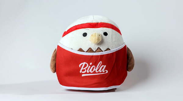 a plush eagle wearing a Biola jersey