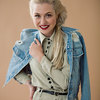 young woman wearing a dress and jean jacket