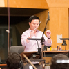 Alex Lu directing musicians