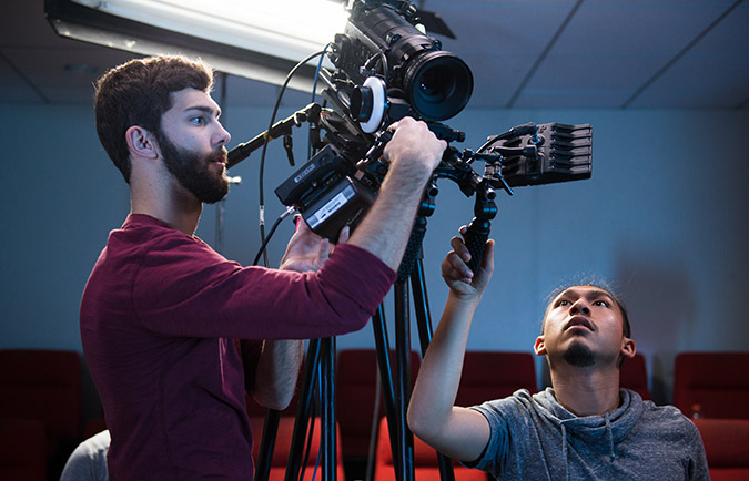 Students using a cinema camera